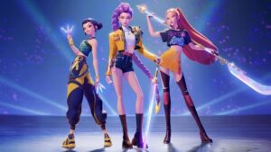 K-Pop Demon Hunters Three animated female characters stand in dynamic poses with glowing weapons and futuristic outfits on a lit stage background.